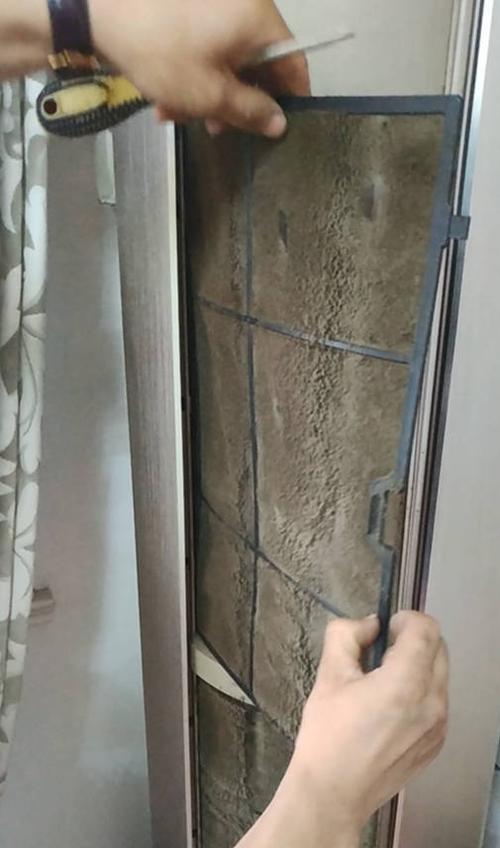 格力圆柱过滤网怎么拆